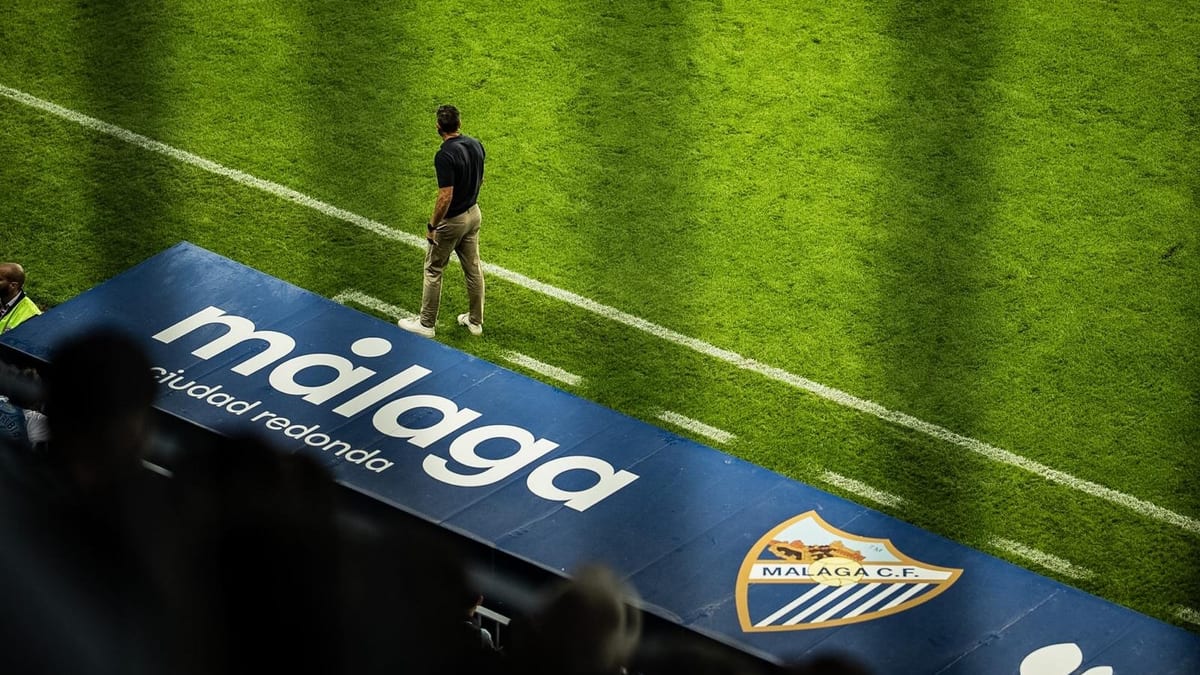 El alcalde de Málaga y el concejal de Deportes en el estadio de La Rosaleda durante el partido Málaga CF vs Real Sociedad