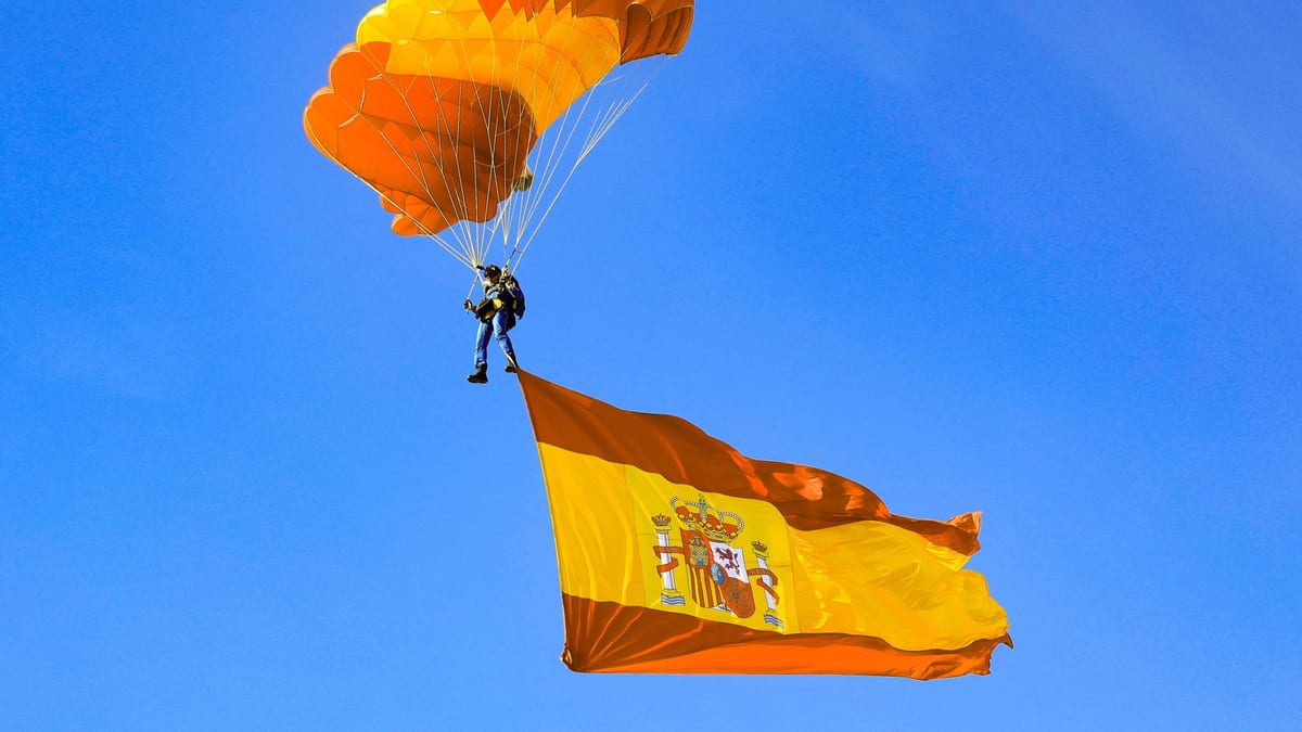Cartel conmemorativo del Día de la Hispanidad 2026 con bandera española y mensaje de unidad nacional