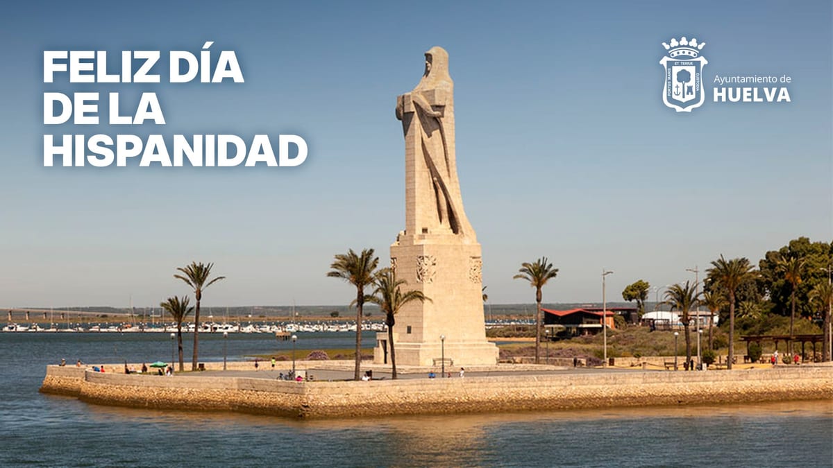 Cartel del Día de la Hispanidad del Ayuntamiento de Huelva con texto felicitación en rojo y blanco