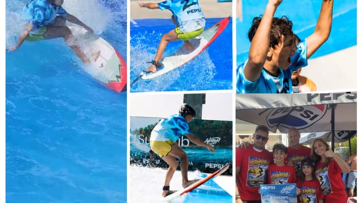 Enrique Quique Sevilla López, campeón infantil de ola artificial con su trofeo en Citywave Madrid